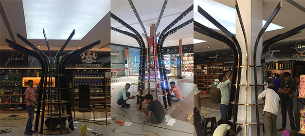 Liquor bottle display rack in Indian wine shop, New Delhi
