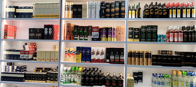 Modern liquor shop display rack with bottle lighting, New Delhi